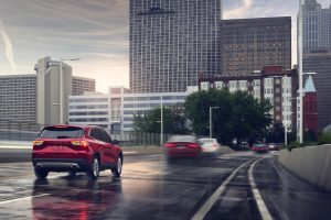 2020 Ford Escape Titanium Driving Into a City
